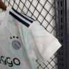 Ajax 2023/24 visitante niños conjunto - Image 5