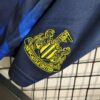 Newcastle United 2023/24 tercera niños conjunto - Image 11