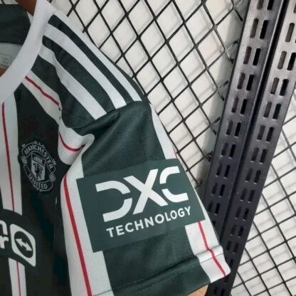 Manchester United 2023/24 visitante niños conjunto - Image 12