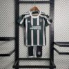 Manchester United 2023/24 visitante niños conjunto